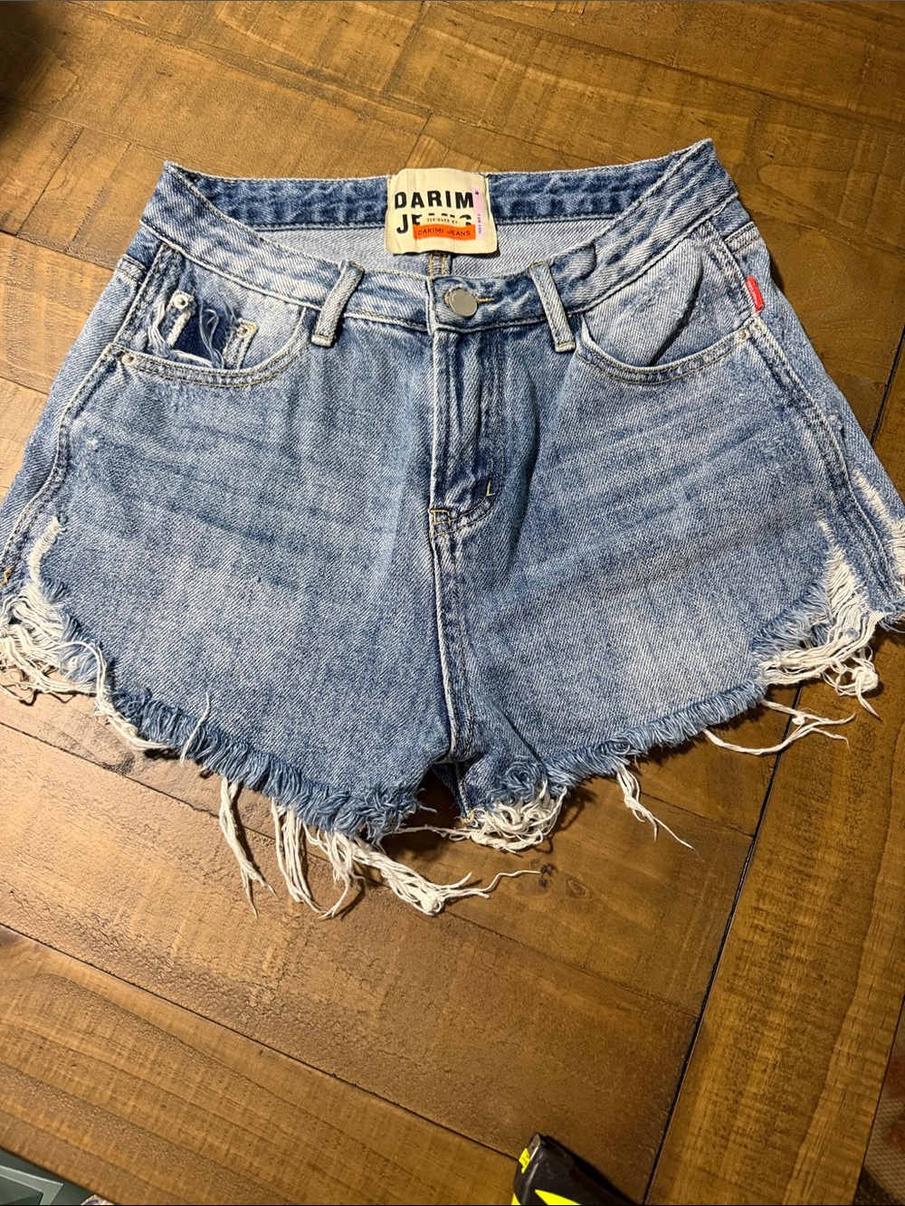 DARIM Light Blue Distressed Denim Shorts with Raw Hem